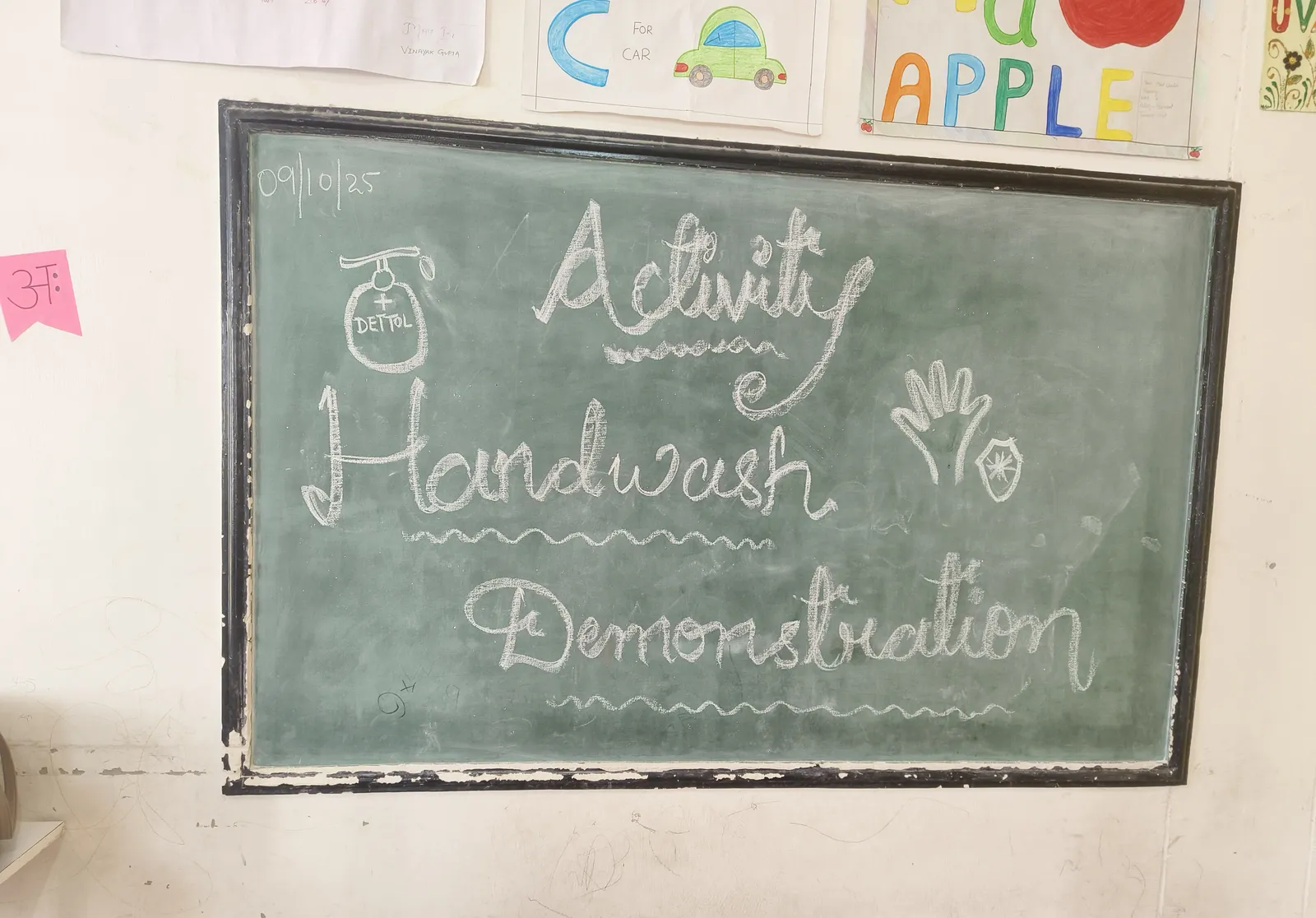 Chalkboard reading Activity: Handwash Demonstration, with drawings of a soap dispenser and a hand